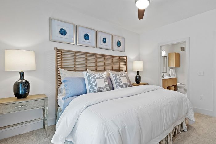 Spacious bedrooms featuring oversized windows, designed to maximize natural light