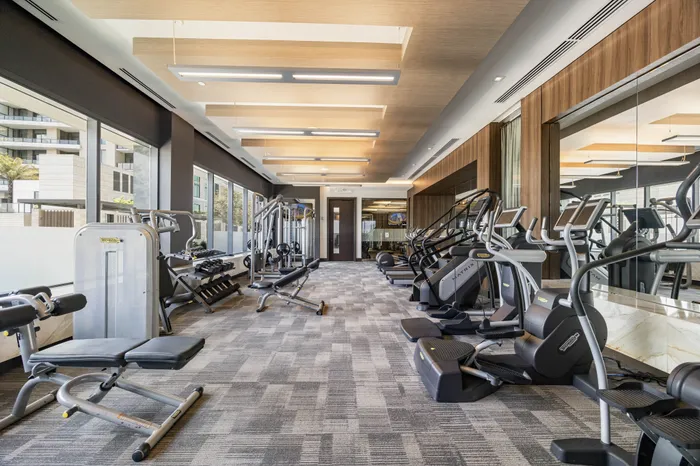 fitness center with both weight and strength training machines and cardio equipment