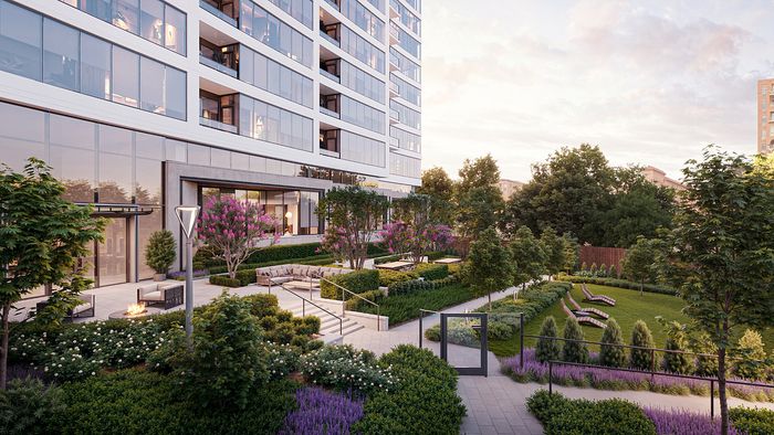 Modern high-rise with elegant glass facade overlooking a beautifully landscaped garden with vibrant flowers and cozy seating areas.