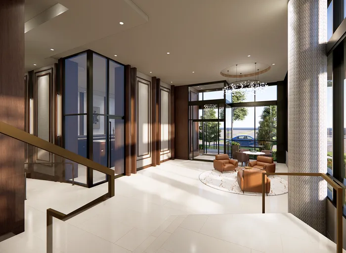 Luxurious modern lobby with elegant lighting, plush seating, and floor-to-ceiling windows offering scenic views.