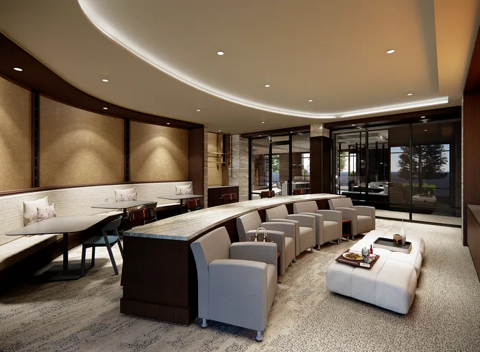 Elegant and modern lounge area featuring plush seating, chic decor, and a sophisticated ambiance with natural lighting.