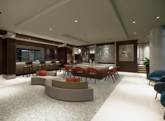 Luxurious open-concept lounge featuring stylish seating, modern bar area, and elegant lighting in a sophisticated setting.