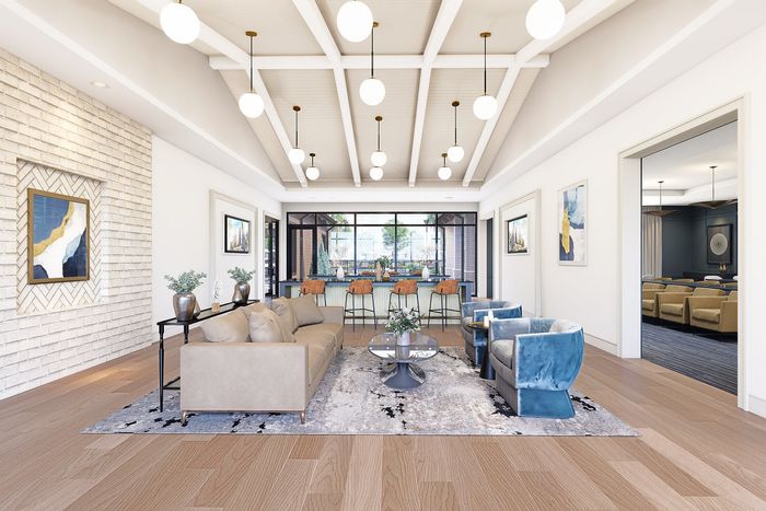 Luxurious open-concept living and dining area featuring elegant lighting, sleek modern furniture, and a large window view.