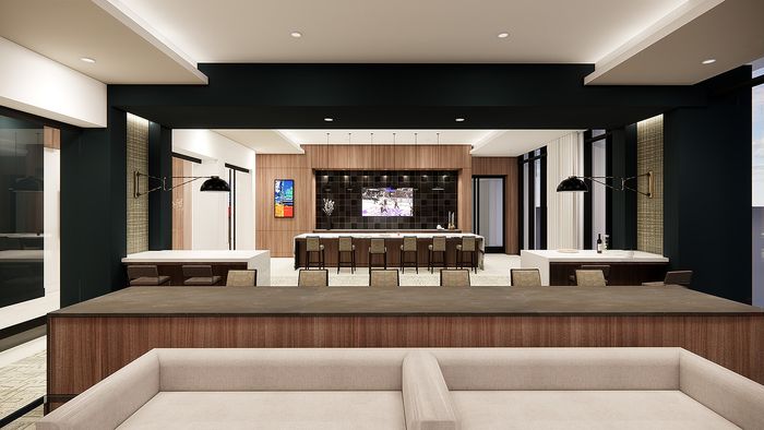 Elegant modern lounge area with stylish bar, plush seating, and ambient lighting, perfect for social gatherings.