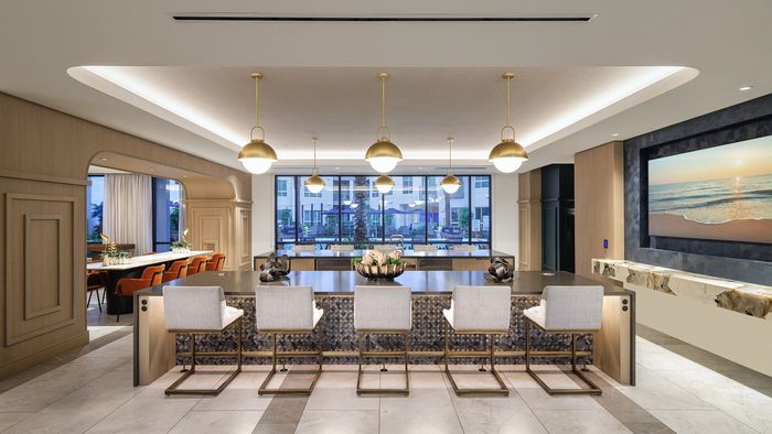 Sleek modern kitchen and dining area with elegant lighting, stylish seating, and a panoramic window view.