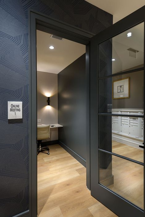 Contemporary online meeting room featuring sleek design, modern lighting, and a comfortable workspace.