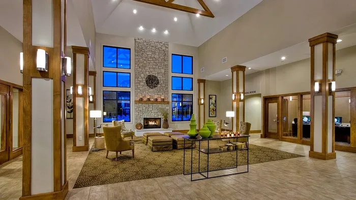 Unwind after a busy day in our comfortable, inviting clubhouse featuring cozy seating areas and a warm, welcoming atmosphere. |  International Village Lombard |