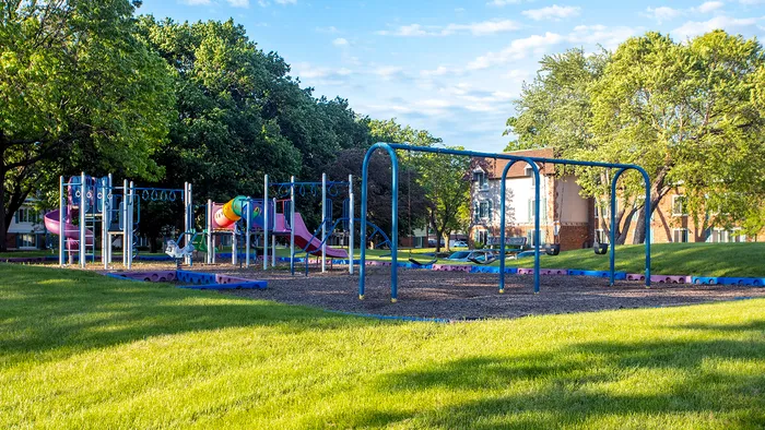 See how everyone enjoys our engaging playground designed for safe and active play. Just one more way our community caters to your needs!  | International Village Schaumburg | International Village Schaumburg Apartments