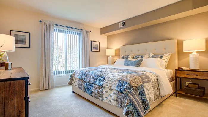 Your primary bedroom suite provides luxurious privacy with ensuite bathroom and walk-in closet convenience.  | International Village Schaumburg | Schaumburg Apartments