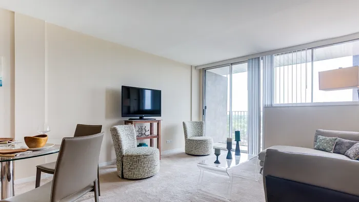 This thoughtfully designed living room maximizes comfort and functionality with smart layout choices. | The Glen View |