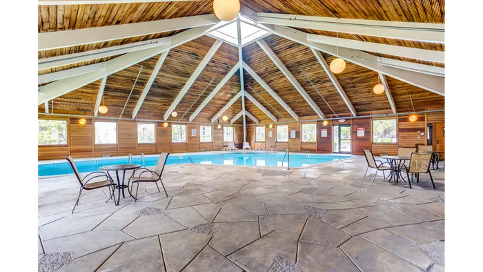Our pool's water feature adds visual appeal and soothing sounds while enhancing your swimming and relaxation experience.  | International Village Schaumburg | International Village Schaumburg Apartments
