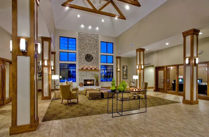 Gather, socialize, and relax in our tastefully decorated community clubhouse with comfortable seating areas. | International Village Schaumburg | Apartments in Schaumburg