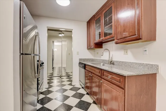 The modern kitchen offers streamlined design with efficient workflow and attractive finishes throughout.  |  International Village Lombard |  International Village Lombard Apartments