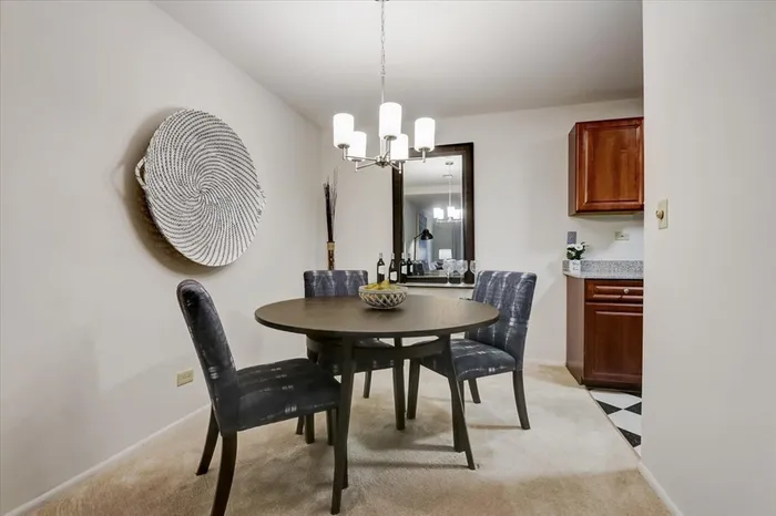 The separate dining area provides dedicated space for meals and entertaining while maintaining distinct room definition.  |  International Village Lombard | Lombard Apartments