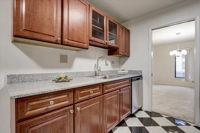 This prep-friendly kitchen maximizes workspace and storage with thoughtful layout designed for efficient cooking.  |  International Village Lombard | Lombard Apartments