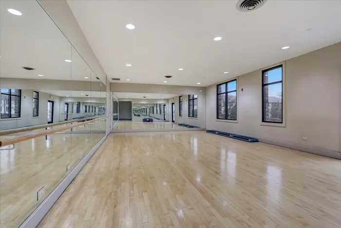 Find balance and strength in our tranquil yoga studio featuring natural light and all the equipment needed for your practice. | International Village Schaumburg | International Village Schaumburg Apartments