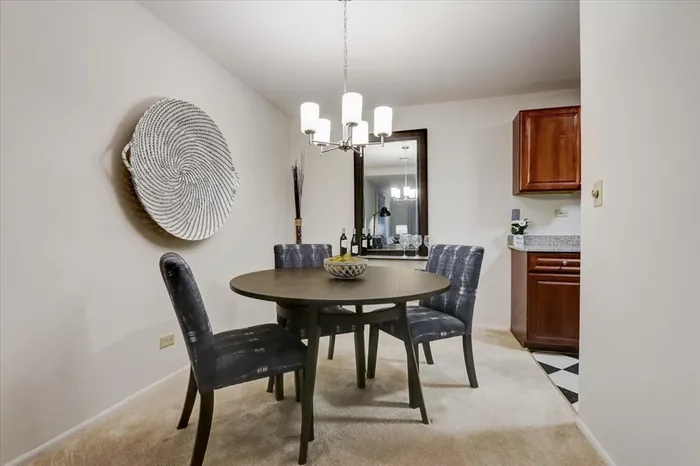 The separate dining area provides dedicated space for meals and entertaining while maintaining distinct room definition.  | International Village Schaumburg | Schaumburg Apartments