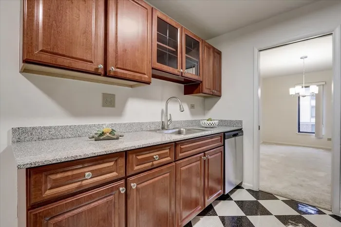 The modern kitchen offers streamlined design with efficient workflow and attractive finishes throughout.  | International Village Schaumburg | International Village Schaumburg Apartments