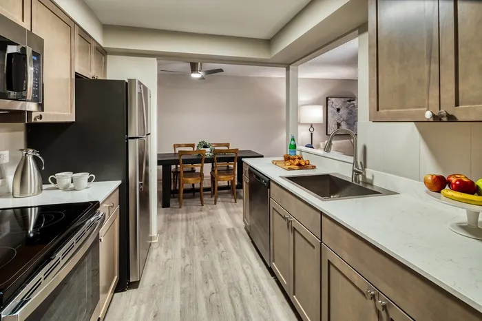 This primary bedroom with attached bath offers convenient privacy and comfort with ensuite bathroom access. | The Views Of Naperville | Apartment in The Views Of Naperville