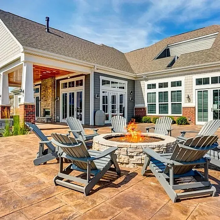 Gather around our community fire pit for evening relaxation, conversation, and marshmallow roasting. | Northgate Crossing of Wheeling | Northgate Crossing of Wheeling Apartments