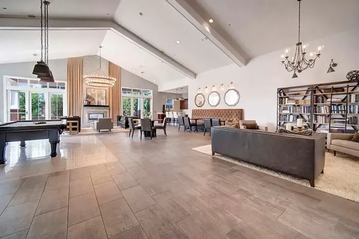 Gather, socialize, and relax in our tastefully decorated community clubhouse with comfortable seating areas. | Northgate Crossing of Wheeling | Apartments in Wheeling