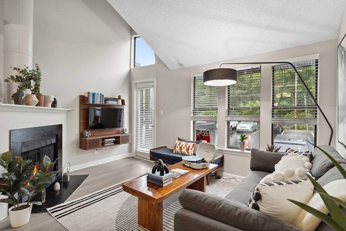 furnished living room with fireplace