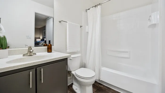 ReNew One59 Bathroom with one sink, shower, and toilet