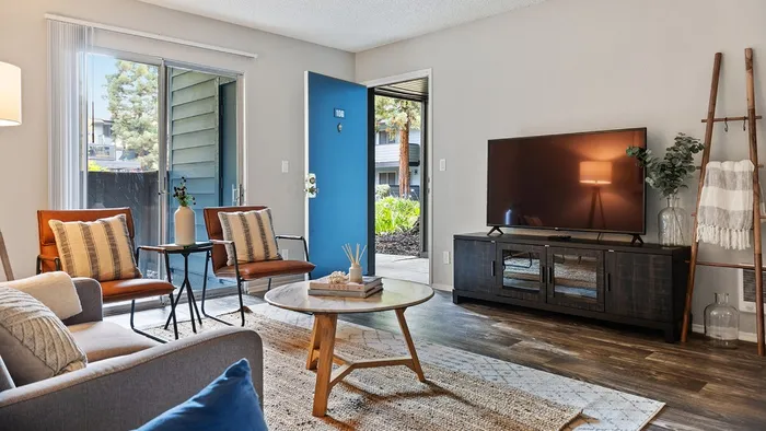ReNew One59 Bright and Airy Furnished living room with View of Private Patio or Balcony