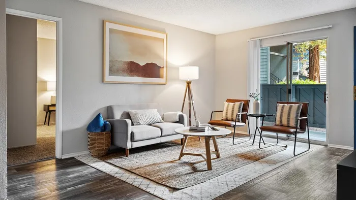ReNew One59 Bright and Airy Living Room with View of Private Patio or Balcony