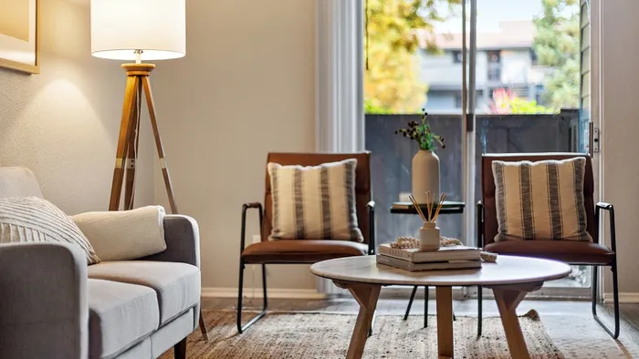 ReNew One59 Furnished living room with View of Private Patio or Balcony