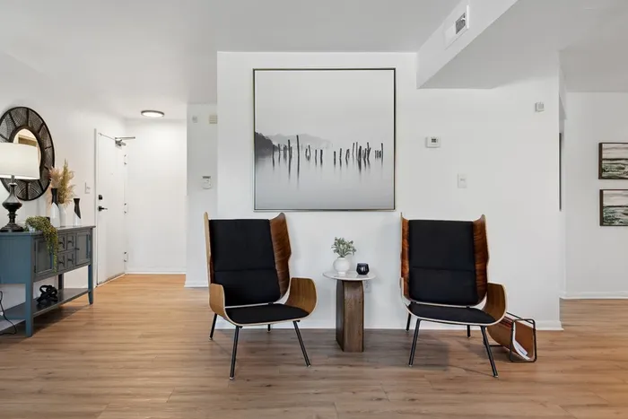 ReNew Virginia Beach living room seating with modern art