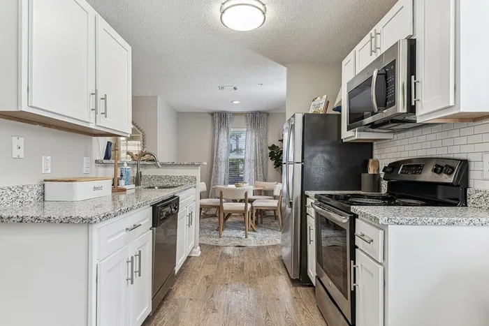 ReNew Marina Shores Kitchen with White Cabinetry
