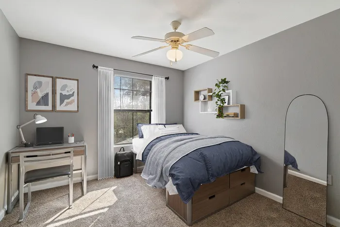 Townhomes at TSC Bedroom with Natural Light and Ceiling Fan