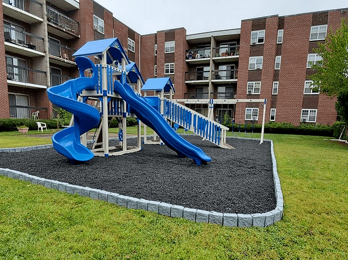 ReNew Bristol Open Playground with Lush Green Surroundings.