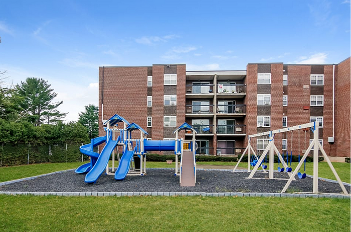ReNew Bristol Open Playground with Lush Green Surroundings.