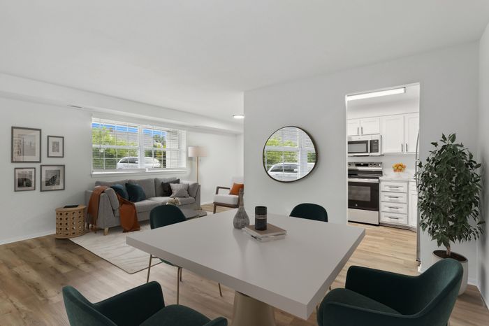 ReNew Parkville Dining Area and Living Room with Bright Natural Light