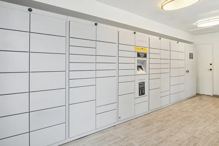 Modern package locker system in a sleek apartment building, providing secure and convenient parcel management.