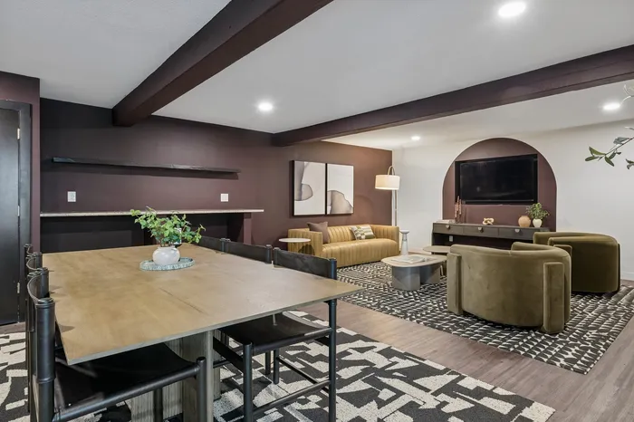 Chic modern living area with stylish furniture, cozy lighting, and elegant decor creating a warm ambiance.