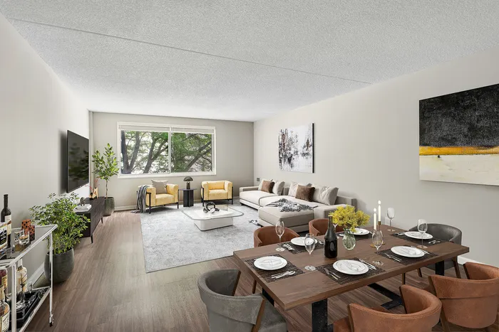 Modern living and dining area with stylish decor, comfortable seating, large window with natural light, and sophisticated dining setup.