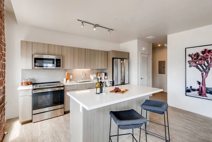 Contemporary kitchen with sleek cabinetry, modern appliances, and a spacious island perfect for entertaining.