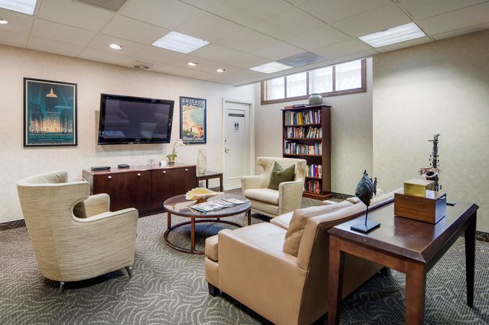 Inviting living room with plush seating, stylish decor, and modern entertainment features, perfect for relaxation and leisure.