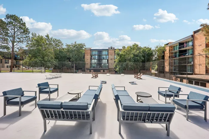 Spacious outdoor terrace with stylish seating and picturesque views, perfect for relaxation and gatherings.