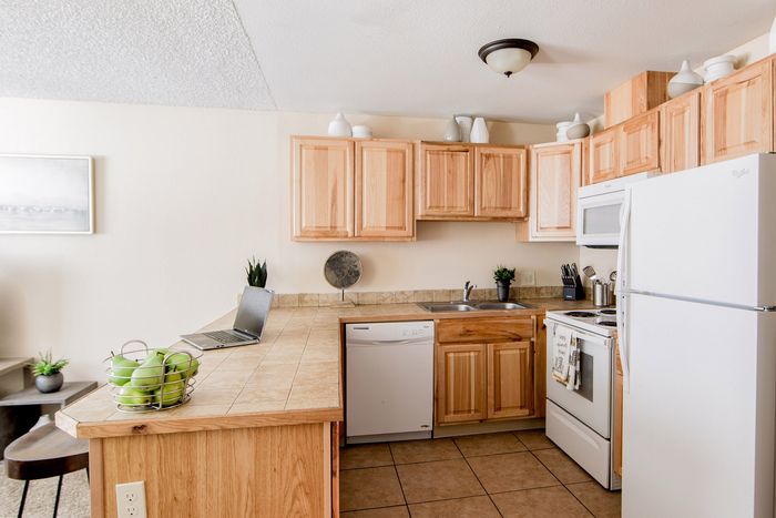 ReNew Evergreen (Evergreen Garden) - Kitchen with Wood Cabinets