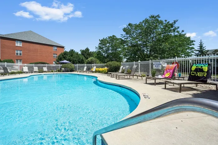 Outdoor swimming pool at Barrington Place Apartments in Madison, Wisconsin for seasonal relaxation and recreation.