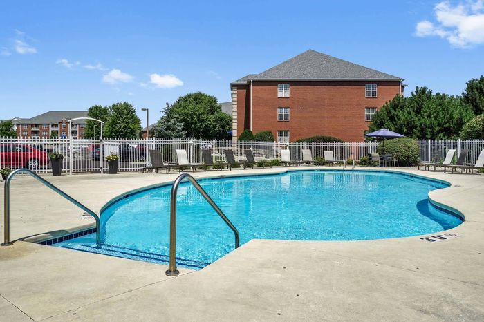Outdoor swimming pool at Barrington Place Apartments in Madison, Wisconsin for seasonal relaxation and recreation.