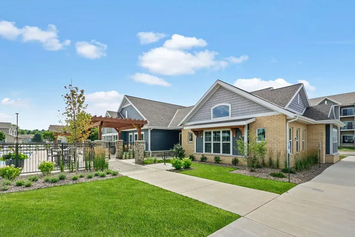 Clubhouse exterior at The 85 at Maple Grove showcasing shared community amenities in Madison, Wisconsin.