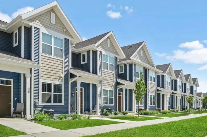 Townhome exterior at The 85 at Maple Grove showcasing attached residences in Madison, Wisconsin.