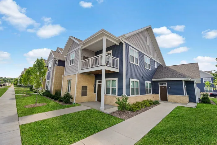Stacked flats exterior at The 85 at Maple Grove highlighting multi-level residences in Madison, Wisconsin.