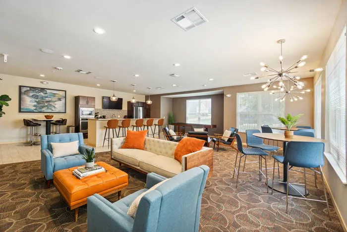 Community clubhouse at Elan Apartments in Fitchburg, Wisconsin featuring shared indoor amenities for residents.