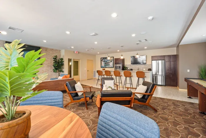 Community clubhouse at Elan Apartments in Fitchburg, Wisconsin featuring shared indoor amenities for residents.